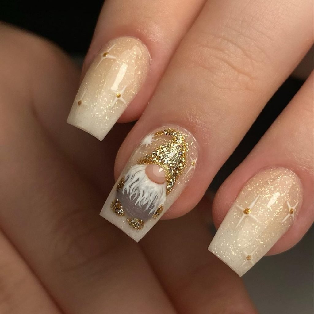 Festive gold and white nail art with glitter and gnome design, perfect for holiday fashion and style inspiration.