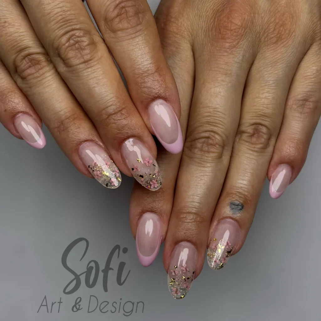 Elegant pink and gold glitter nail art design on oval-shaped nails by Sofi Art & Design.